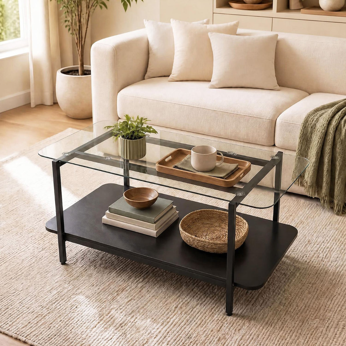 Black 2-tier tempered glass coffee table with storage shelf, modern living room furniture by Wilsons Home Store.