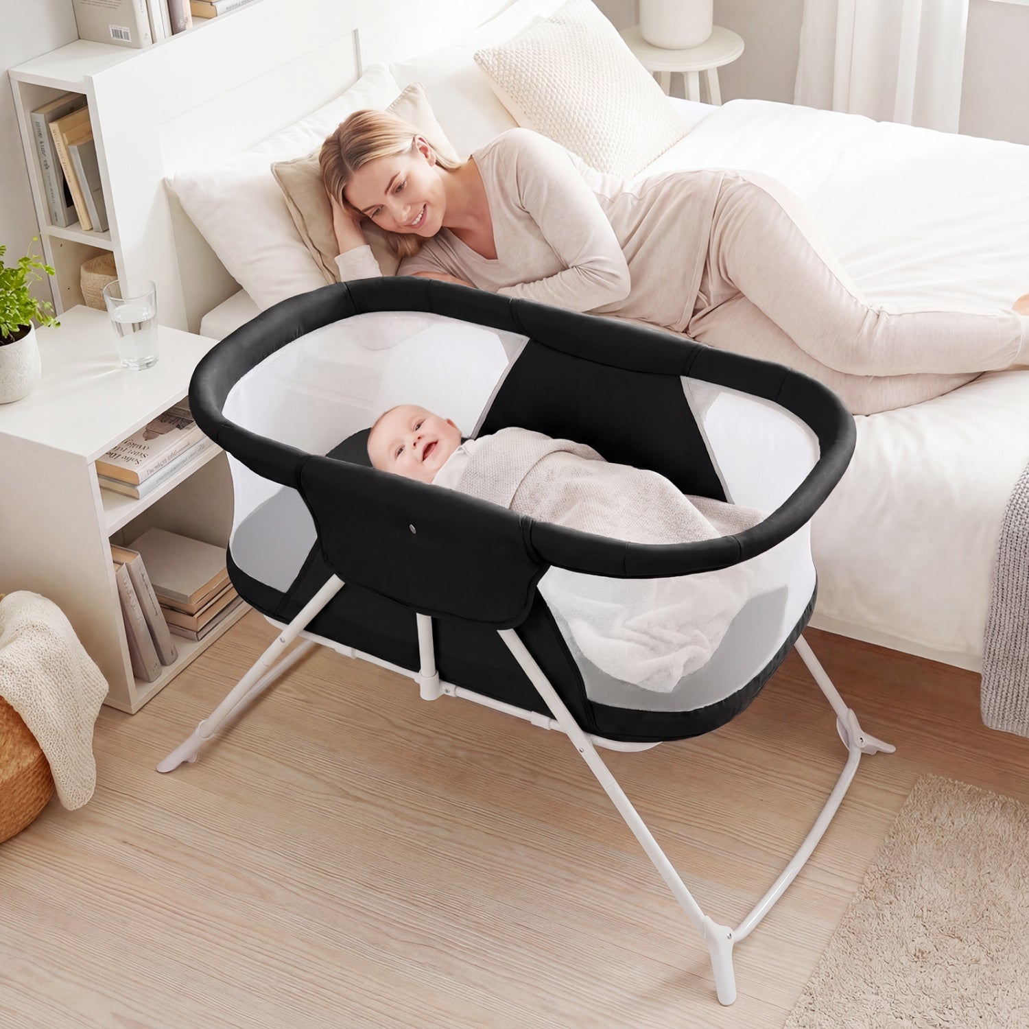 Beige 2-in-1 baby bassinet with rocking motion and breathable mesh, foldable bedside sleeper designed for nursery comfort.