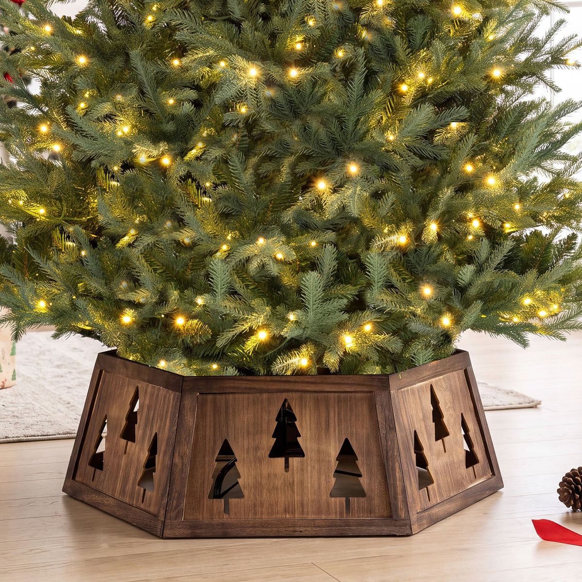 Decorative 31.5-inch Christmas tree collar with antler design for 6-9 ft artificial trees, tool-free setup by Wilsons Home Store