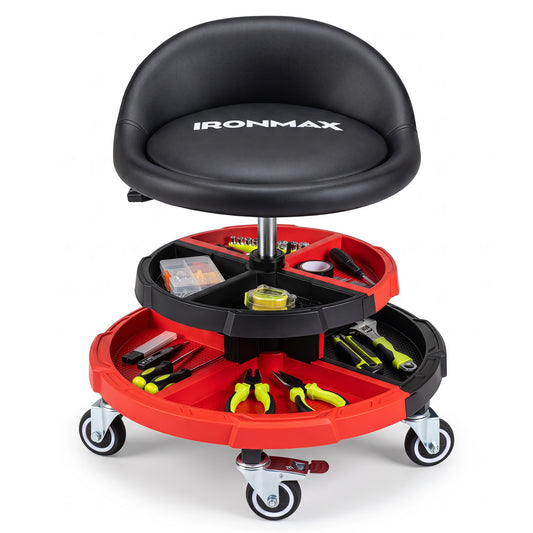 Red 360° rolling mechanic stool with two tool storage trays, ideal for outdoor garages and workshop organization.
