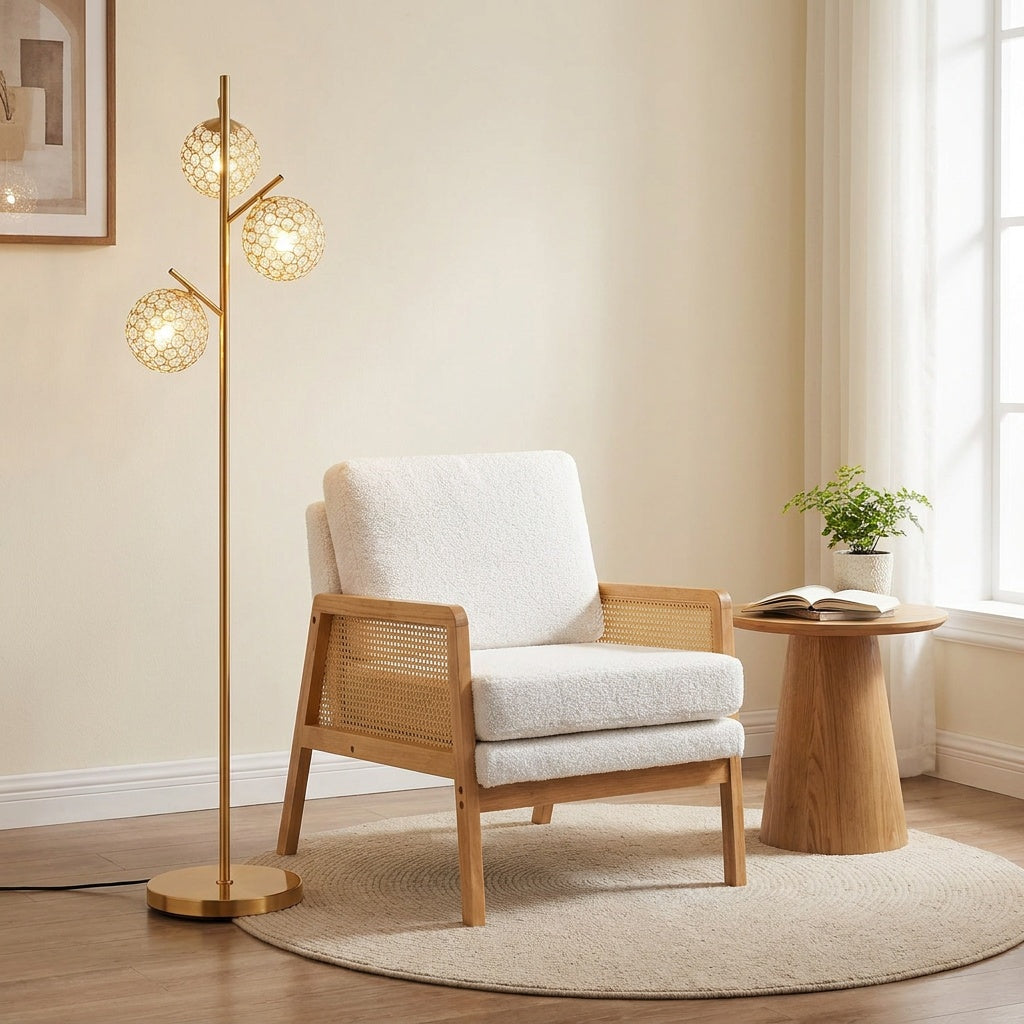 Three-globe floor lamp and mid-century modern accent chair in a stylish living room setting, featuring warm lighting and contemporary decor.