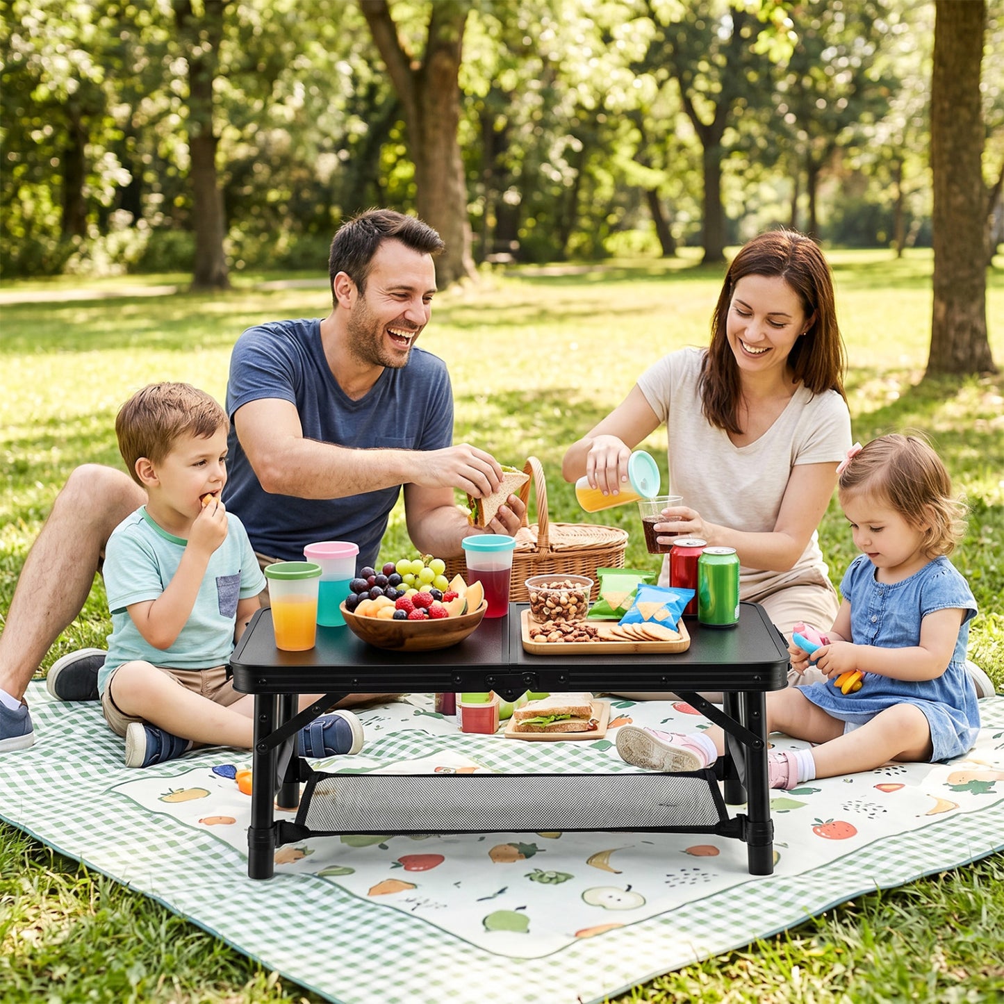 Black 3-height folding camping table with large storage net and handle, ideal for outdoor camping and versatile use.