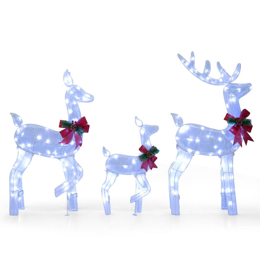 Three white lighted Christmas reindeer figures forming a family set for outdoor yard decoration, perfect for holiday festive display.