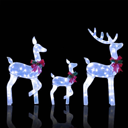 White 3-piece Christmas lighted reindeer family yard decor set by Wilsons Home Store, festive holiday outdoor decoration.