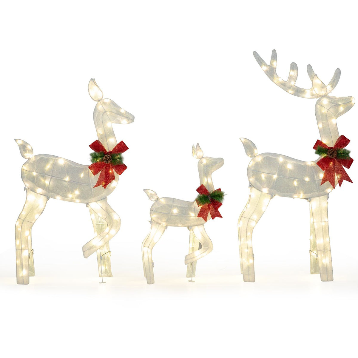 Three white lighted Christmas reindeer figures forming a family, outdoor holiday yard decor, perfect for festive Christmas displays.