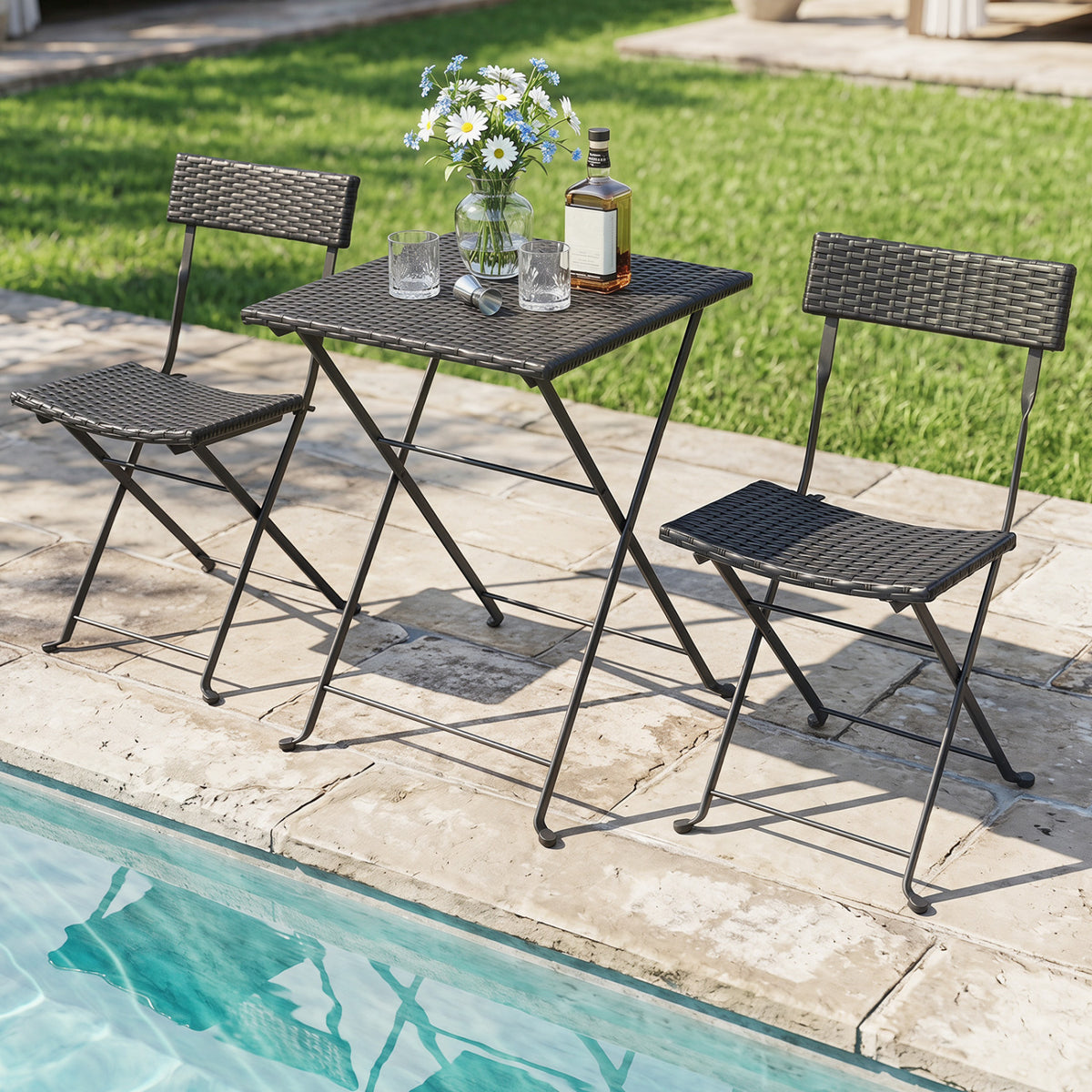 Black 3-piece folding bistro set with PE wicker seats and X-shaped metal frame, ideal for outdoor patio dining.