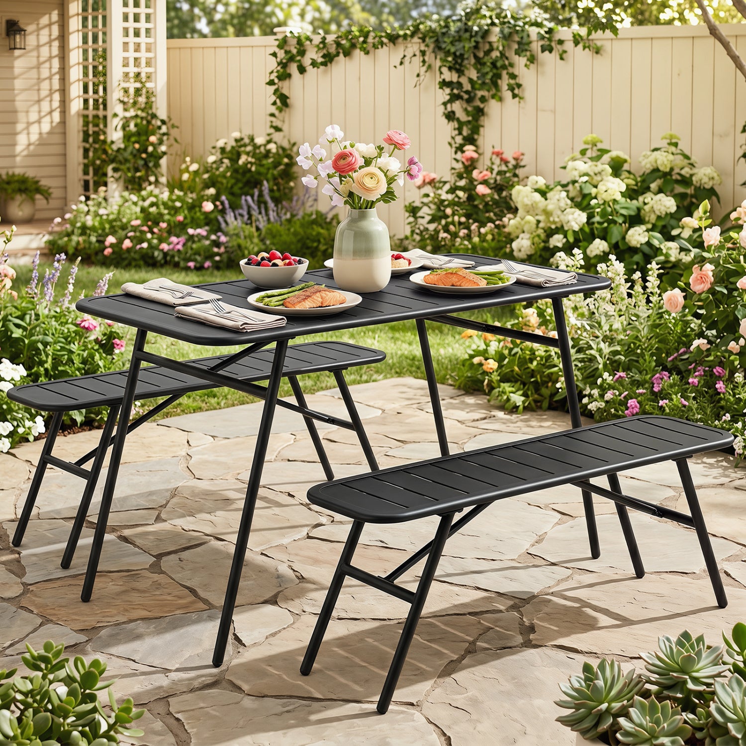 Black 3-piece outdoor dining set with coffee table and two benches, ideal for backyard decks, by Wilsons Home Store.