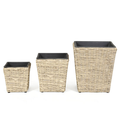 Three-piece rattan planter box kit with removable plastic liners, natural outdoor raised garden beds for flowers and herbs.