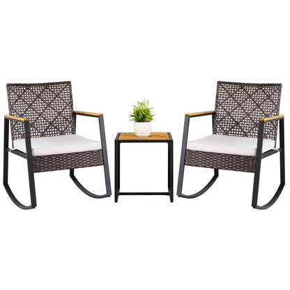 Beige 3-piece wicker outdoor rocking chair set with cushions and coffee table for porch, by Wilsons Home Store.