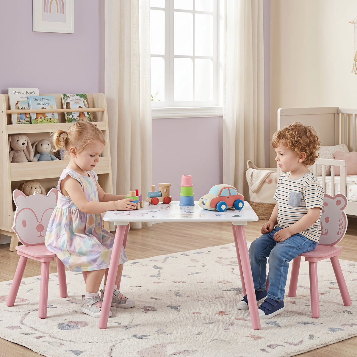 Three-piece kids table and chairs set with colorful animal patterns, designed for toddlers and children, by Wilsons Home Store.