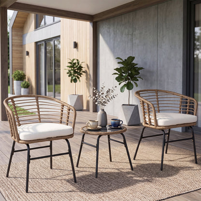 Three-piece outdoor patio furniture set with white cushions, including sofa and chairs, by Wilsons Home Store.