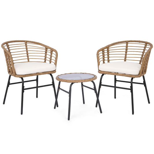 Three-piece outdoor patio furniture set with white cushions, including chairs and a table, by Wilsons Home Store.