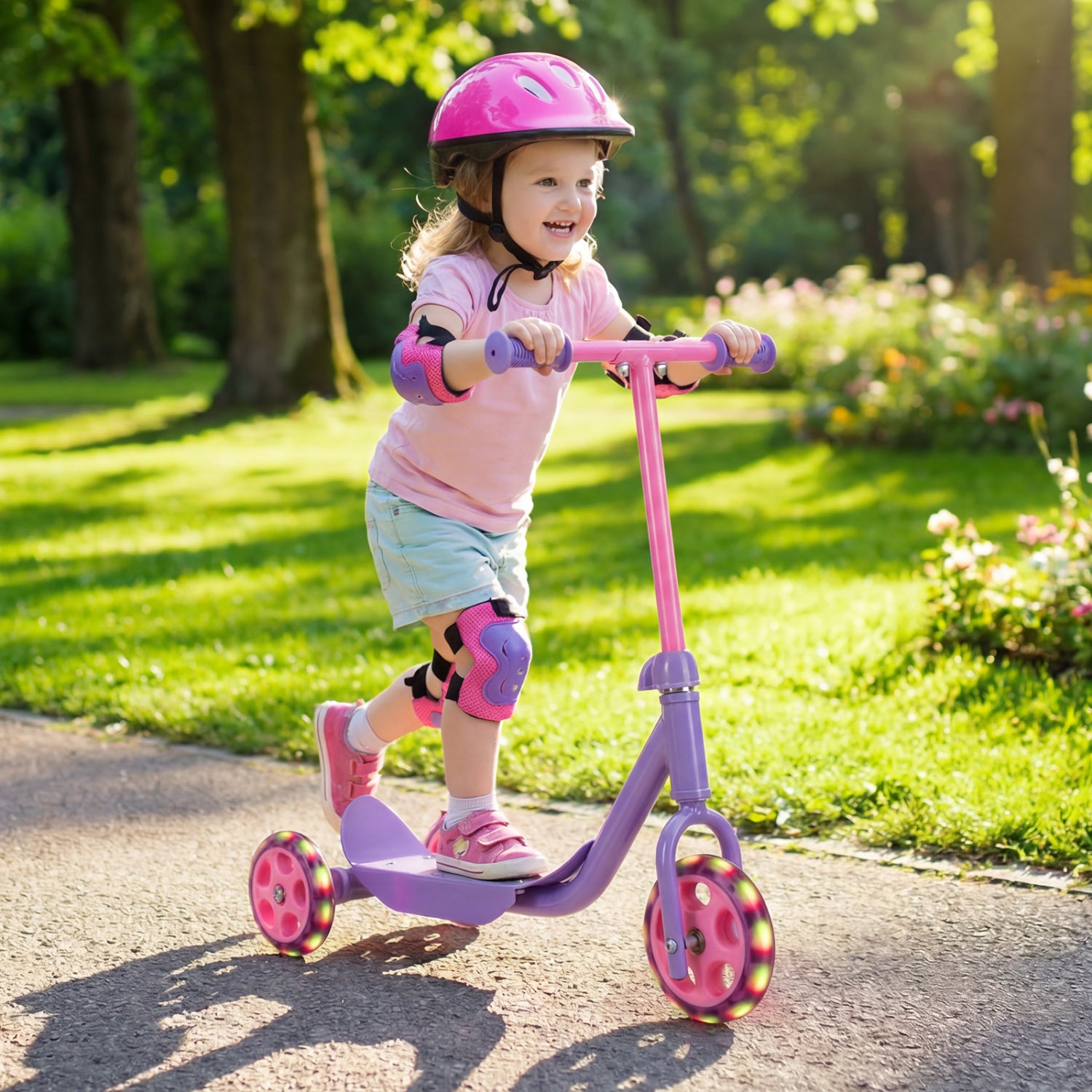 Purple kids' 3-wheel scooter with LED light-up wheels and wide anti-slip deck, suitable for ages 2 and up.