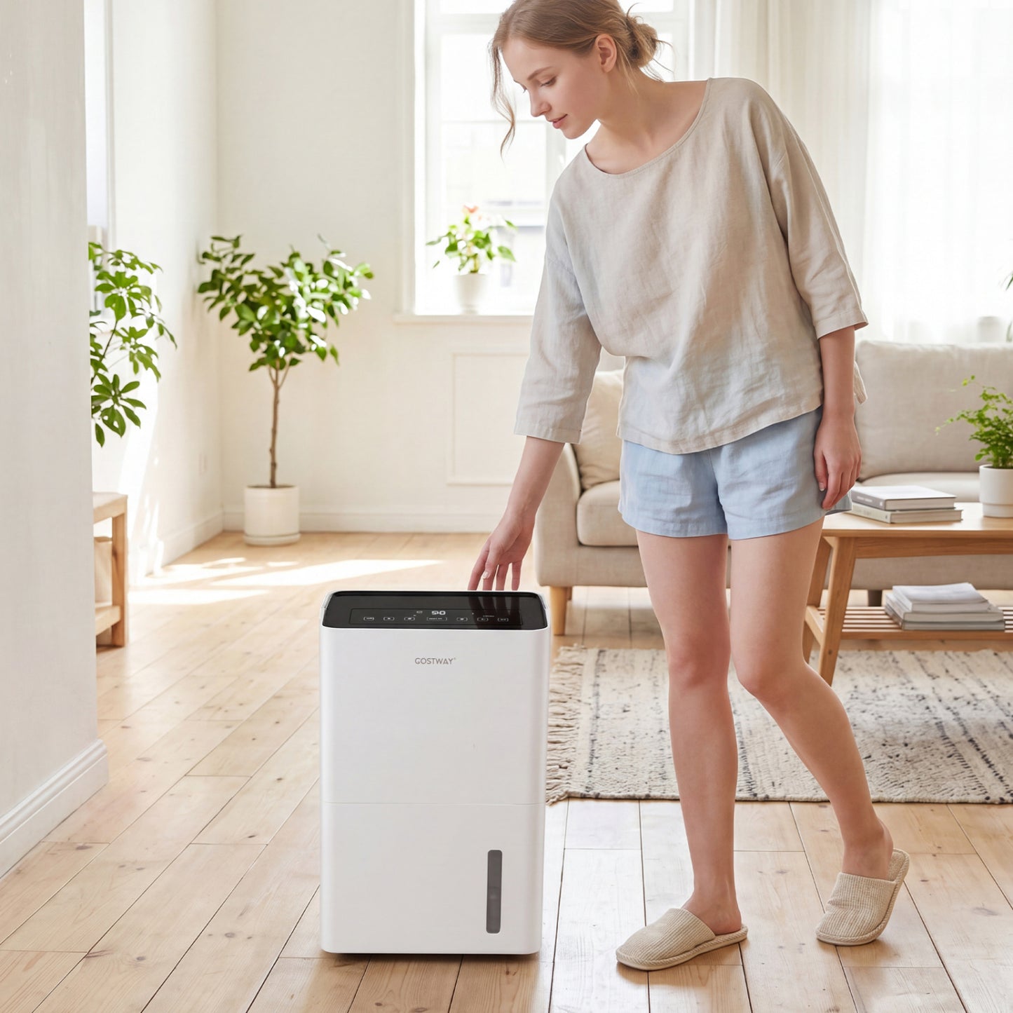 White 80 pint compressor dehumidifier with drain hose, smart humidity control, child lock, suitable for large 4000 sq ft spaces.