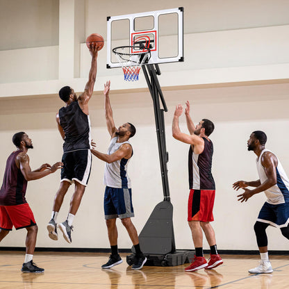 Portable basketball hoop with adjustable height from 4.9 to 10 feet, fillable base, ball storage, by Wilsons Home Store.