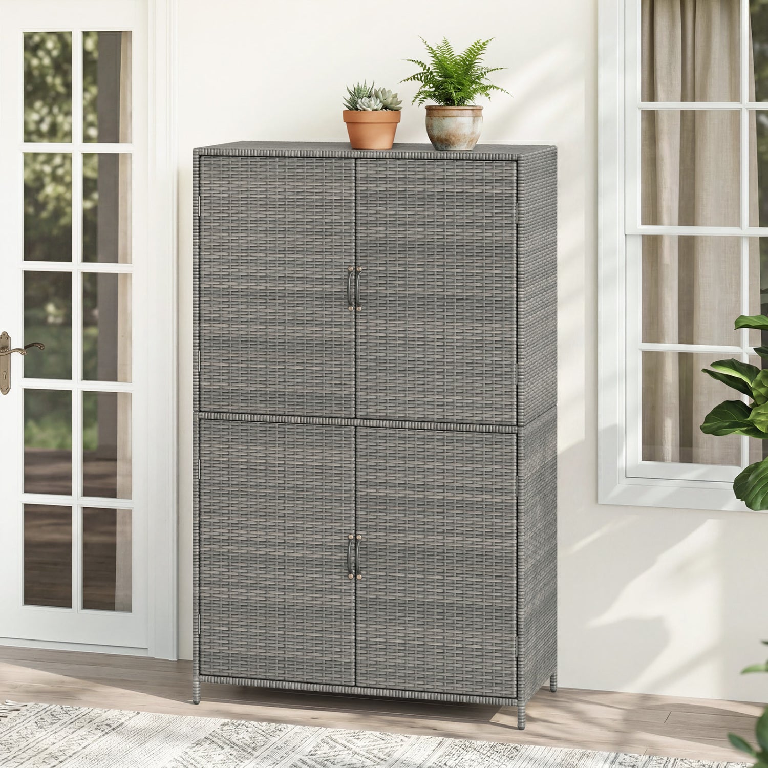 Black 4-door rattan outdoor storage shed with adjustable shelves, ideal for garden or patio organization.