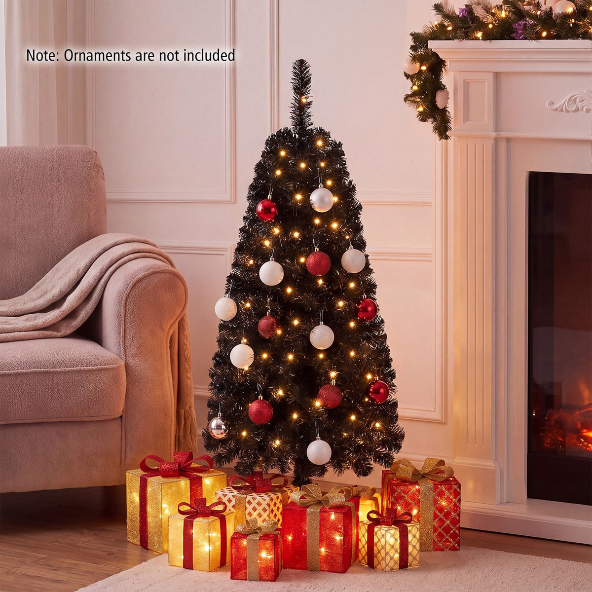 4 ft artificial Christmas tree with 110 branch tips and 50 warm white LED lights, black holiday decor by Wilsons Home Store