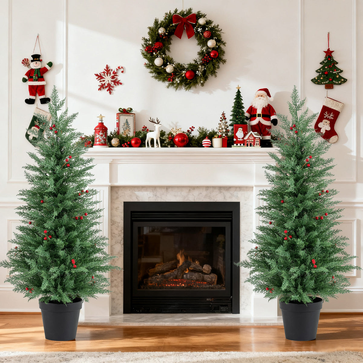 Pair of 4-foot pre-lit Christmas trees with 70 warm white LED lights and 173 branch tips, ideal holiday decor by Wilsons Home Store