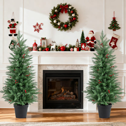 Pair of 4-foot pre-lit Christmas trees with 70 warm white LED lights and 173 branch tips, ideal holiday decor by Wilsons Home Store