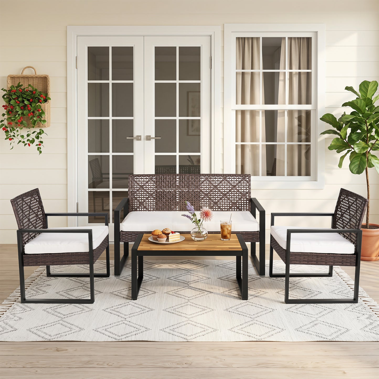 Brown and black 4-piece patio set with wicker chairs and acacia coffee table for outdoor backyard seating.
