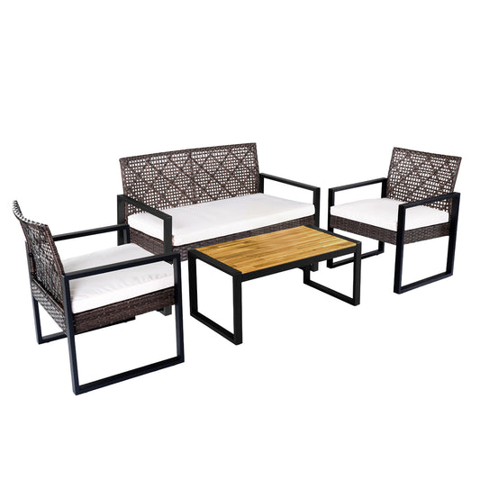 Four-piece outdoor patio set with wicker chairs and acacia coffee table in brown and black, ideal for backyard patio furniture.