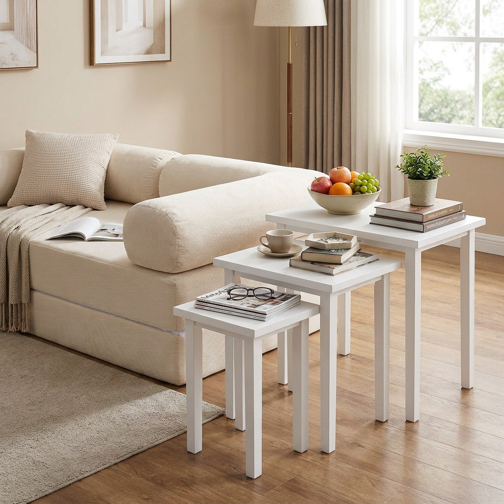 Convertible sofa bed and three-piece side table set from Wilsons Home Store, versatile living room furniture in a modern design.