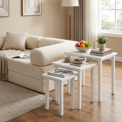 Convertible sofa bed and three-piece side table set from Wilsons Home Store, versatile living room furniture in a modern design.