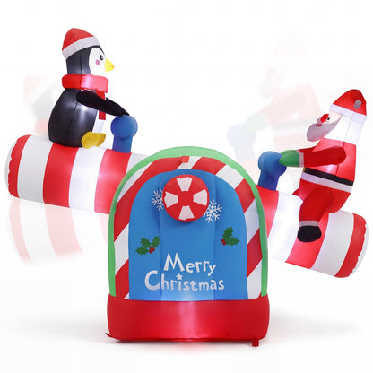 5.1 ft inflatable Christmas Santa and penguin seesaw with LED lights, holiday garden decor, by Wilsons Home Store