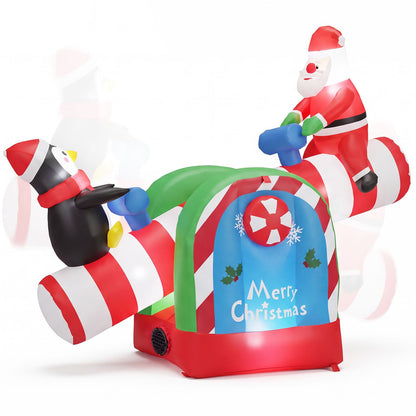 Inflatable 5.1 ft Christmas Santa and Penguin seesaw with LED lights, holiday garden decor, by Direct by Wilsons Home Store