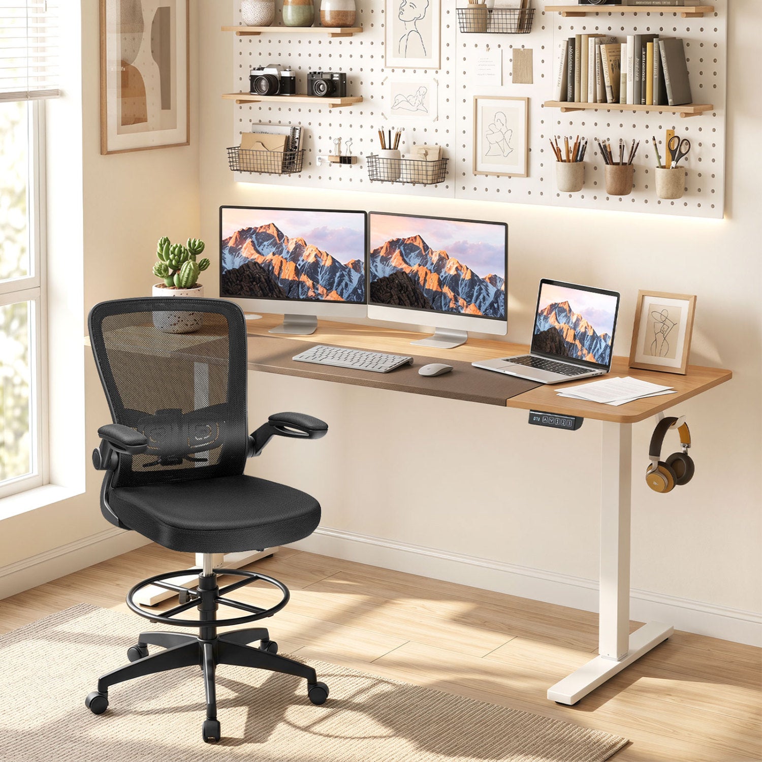 Height adjustable 63x24 inch Wilsons Home Store sit-stand computer desk with three memory presets in natural finish.