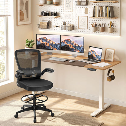 Height adjustable 63x24 inch Wilsons Home Store sit-stand computer desk with three memory presets in natural finish.