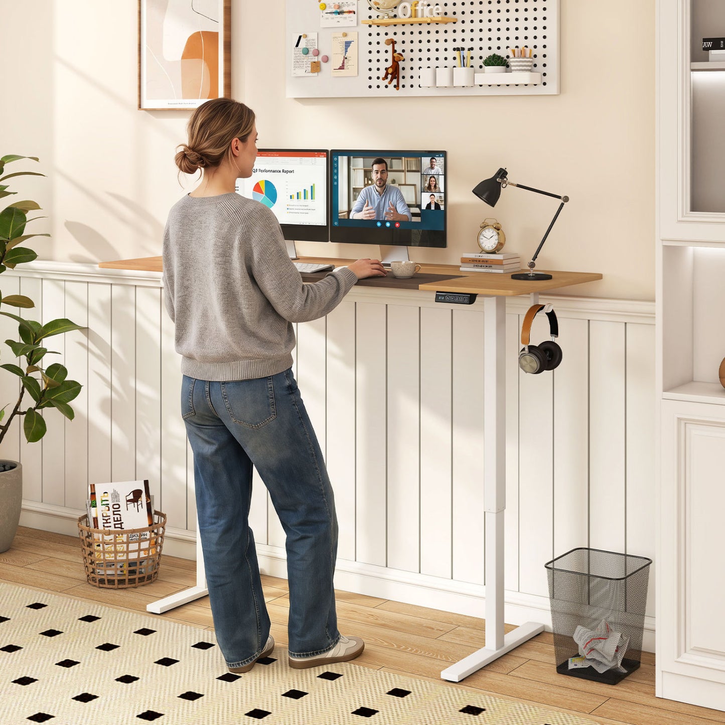 Height adjustable 63x24 inch Wilsons Home Store sit-stand computer desk with 3 memory presets in natural wood finish.