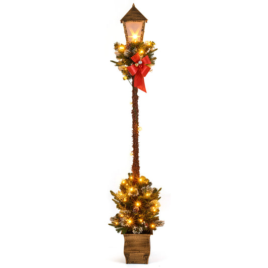 6.1-foot Christmas pre-lit street lamp with artificial greenery and snow-flocked branches for holiday outdoor decor.