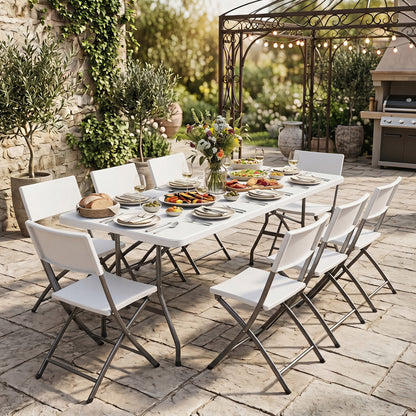 White 6 ft plastic fold-in-half camping table by Wilsons Home Store, perfect for outdoor picnics and patio use.