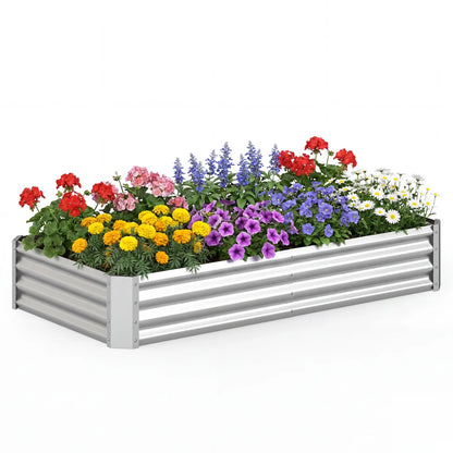 Galvanized steel raised garden bed measuring 6 x 3 x 1 ft with open-ended base, outdoor gardening using durable silver metal.
