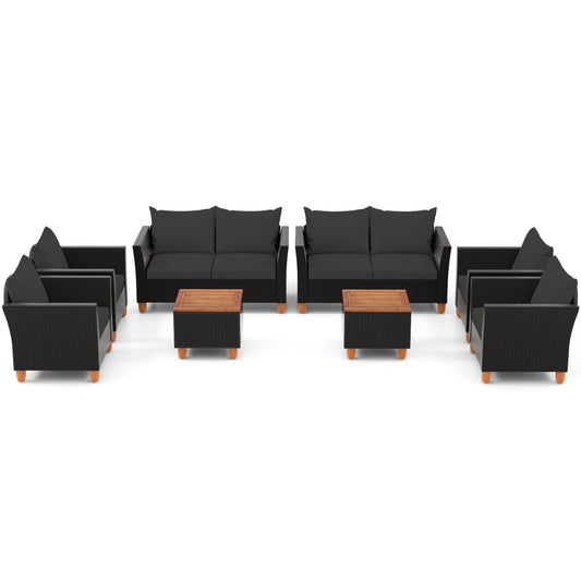 Black 8-piece outdoor conversation set with storage coffee table, featuring cushioned chairs and a central table for patio comfort.