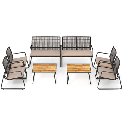 Eight-piece outdoor patio furniture set with acacia wood coffee table and yellow zippered cushions, perfect for outdoor seating.