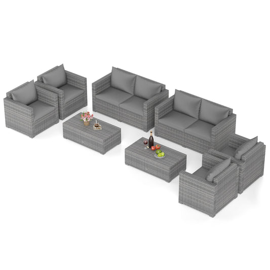 Gray 8-piece patio rattan conversation set with padded cushions, outdoor furniture for yard relaxing and entertaining.