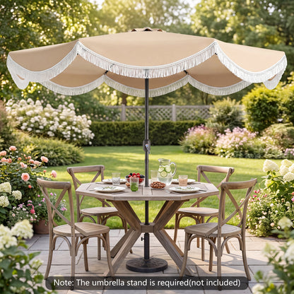 White 9/10 ft outdoor tassel umbrella with push button tilt, providing shade and style for outdoor spaces.