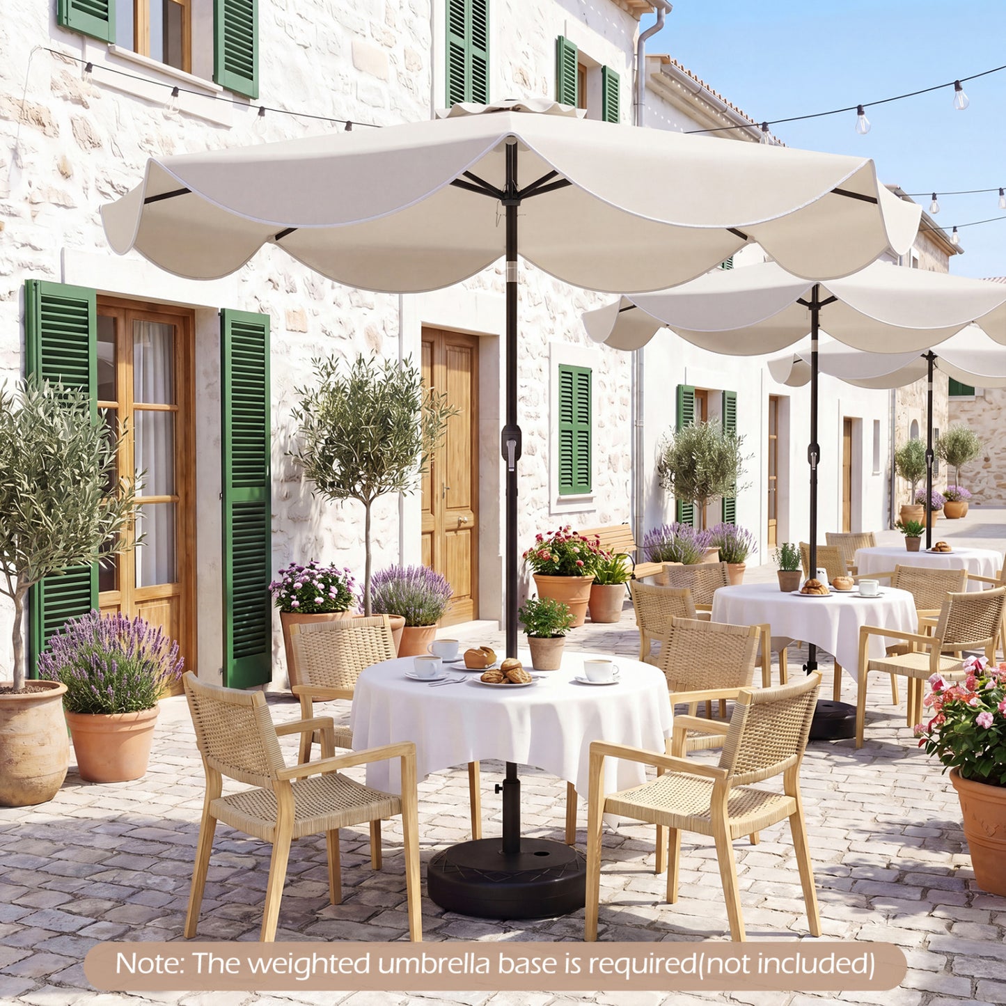 Beige 9 ft scalloped solar patio umbrella with 24 LED lights, ideal for outdoor tables and shade, by Wilsons Home Store.