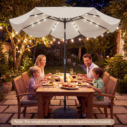 Beige 9 ft scalloped solar patio umbrella with 24 LED lights, designed for outdoor market tables, by Wilsons Home Store.