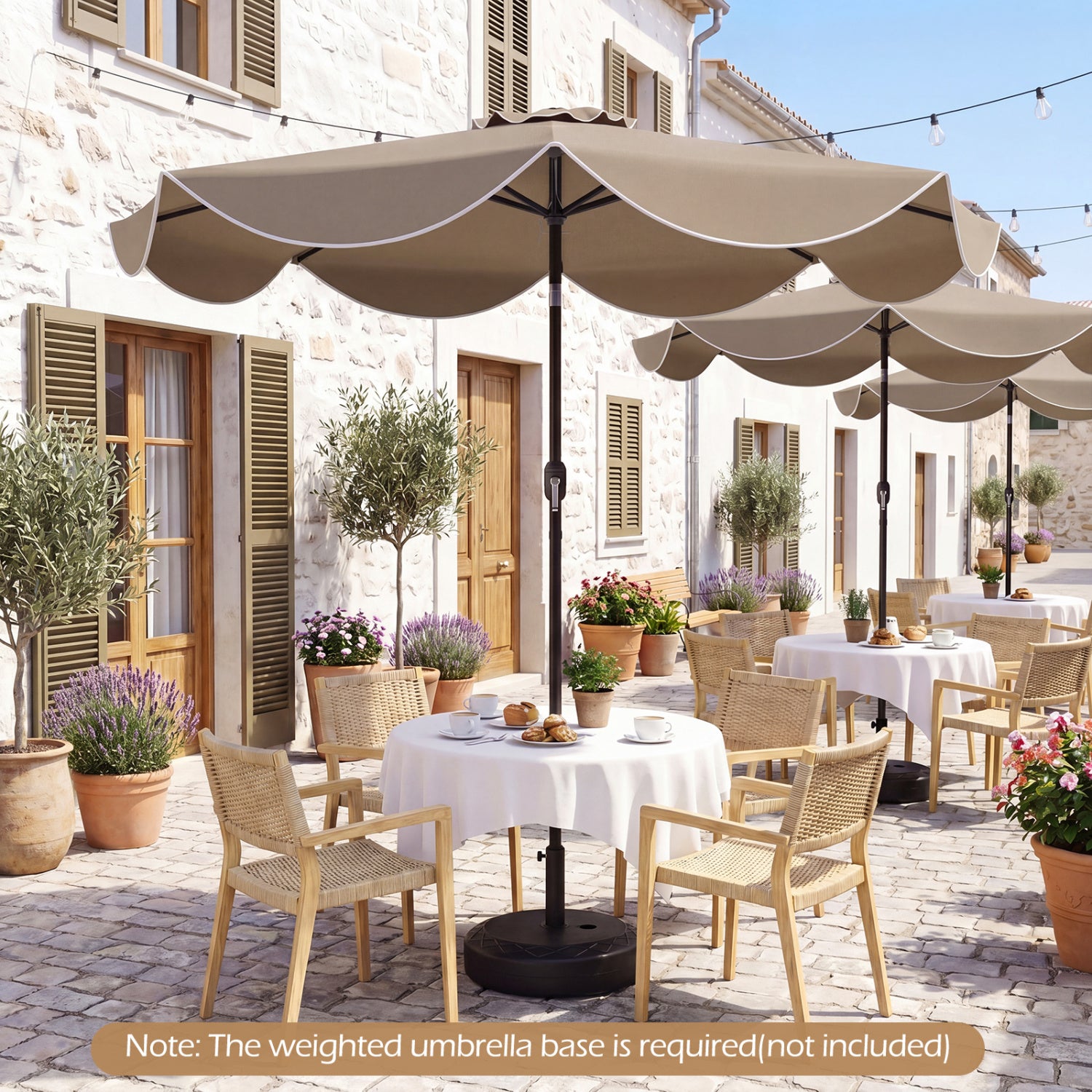 Beige 9 ft scalloped solar patio umbrella with LED lights, outdoor market table umbrella for shade and ambiance.