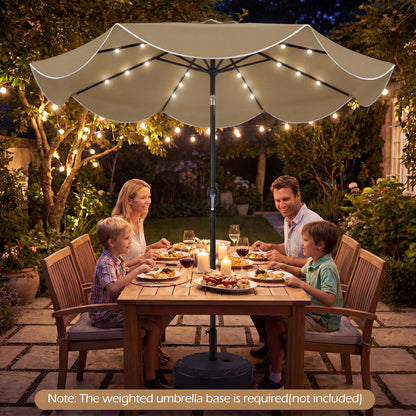 Beige 9 ft scalloped solar patio umbrella with 24 LED lights, ideal for outdoor market tables, by Wilsons Home Store.