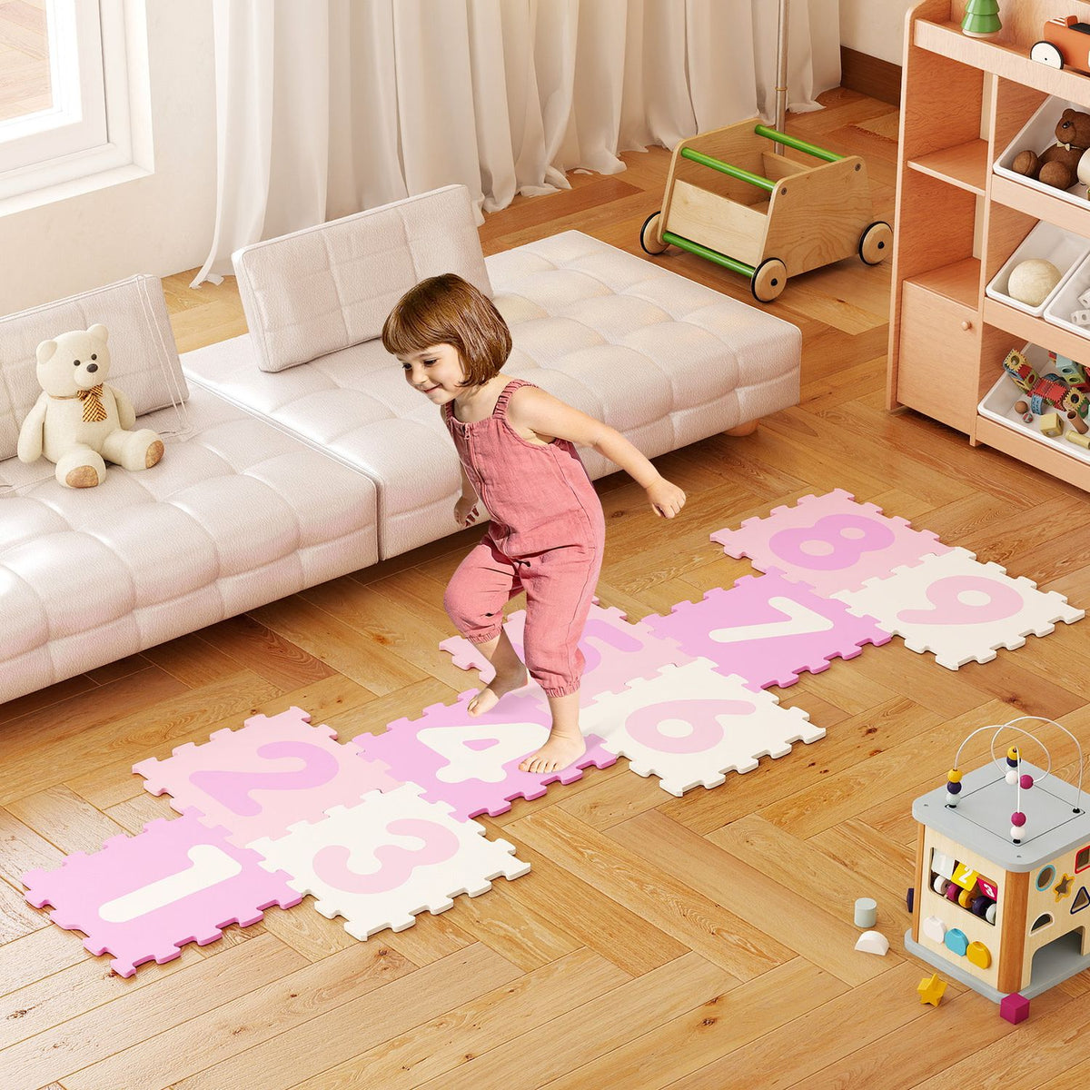 Nine-piece interlocking foam puzzle floor mat with three marker discs, designed for baby play and activity areas.