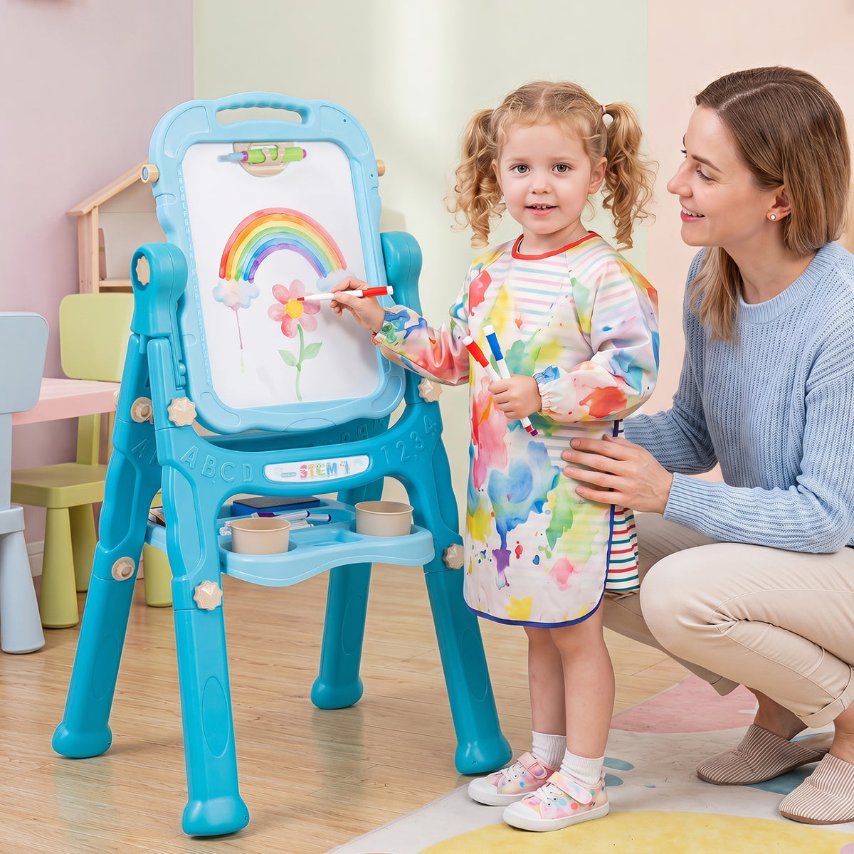 Blue kids' art easel with adjustable height from Wilsons Home Store, perfect for children's painting and drawing activities.