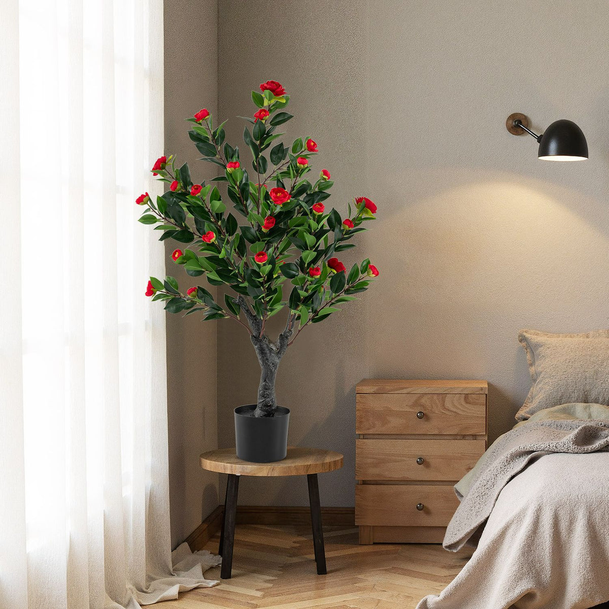 Set of two artificial camellia trees with red fabric blossoms, decorative faux plants for home decor.