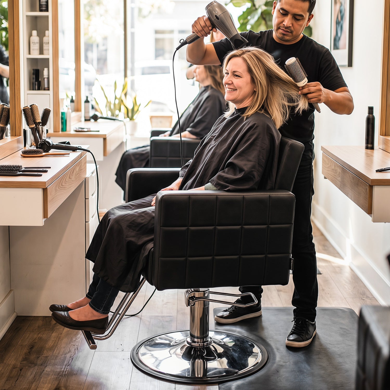 Black barber salon chair with hydraulic pump, adjustable height, 360° swivel, suitable for beauty salons and spa use.