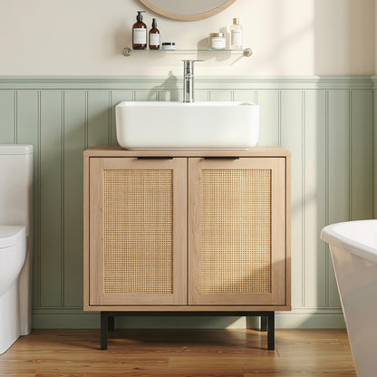 Brown bathroom vanity cabinet with U-shaped cut-out, two rattan doors, and shelf for bath floor storage.