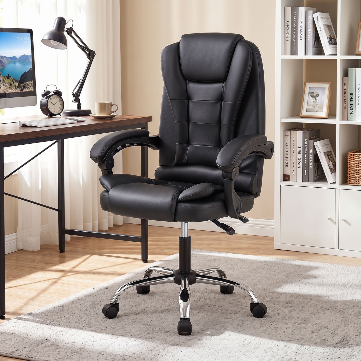 Black high-back executive office chair with leather padded seat and linkage armrests, designed for comfort and support.