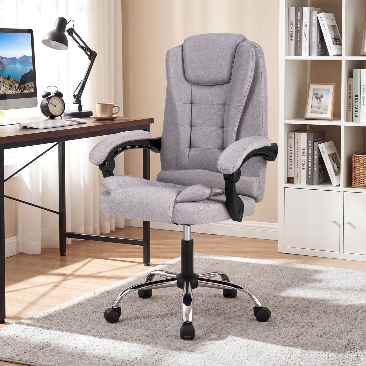 Black high back executive office chair with leather padded seat, linkage armrests, designed for big and tall users.